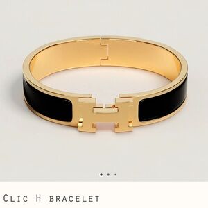 Hermes Clic H Bracelet in Black and Gold